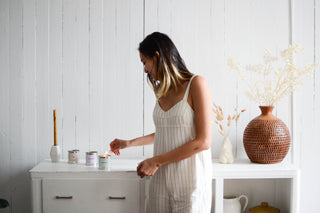 mala founder, melody, lighting candles and smiling